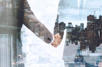 Corporate business handshake between business partners